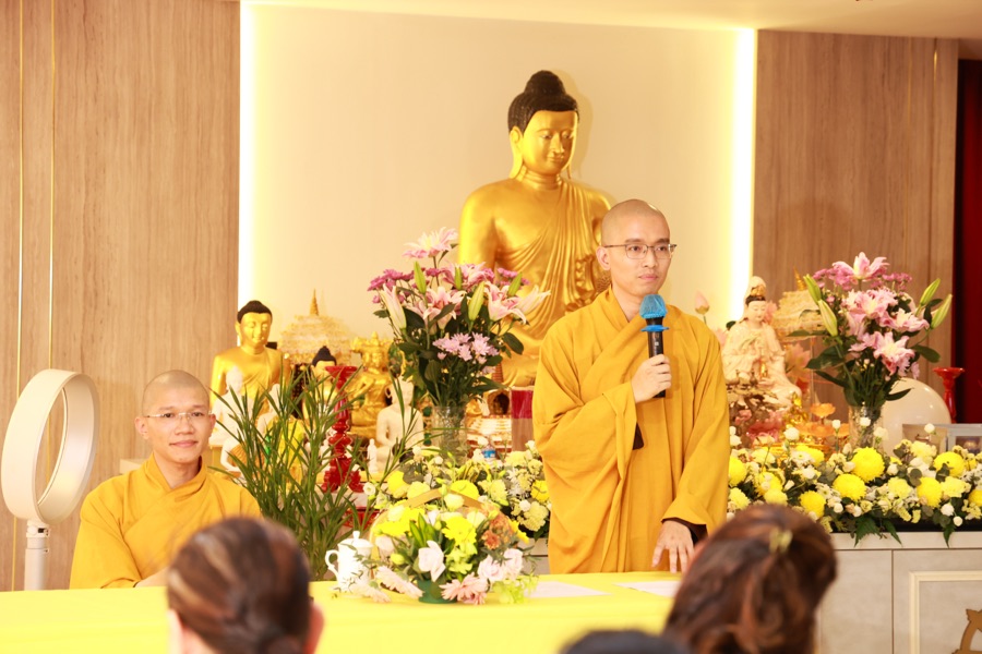 A Venerable Monk sharing a Dharma talk before the Buddha altar
